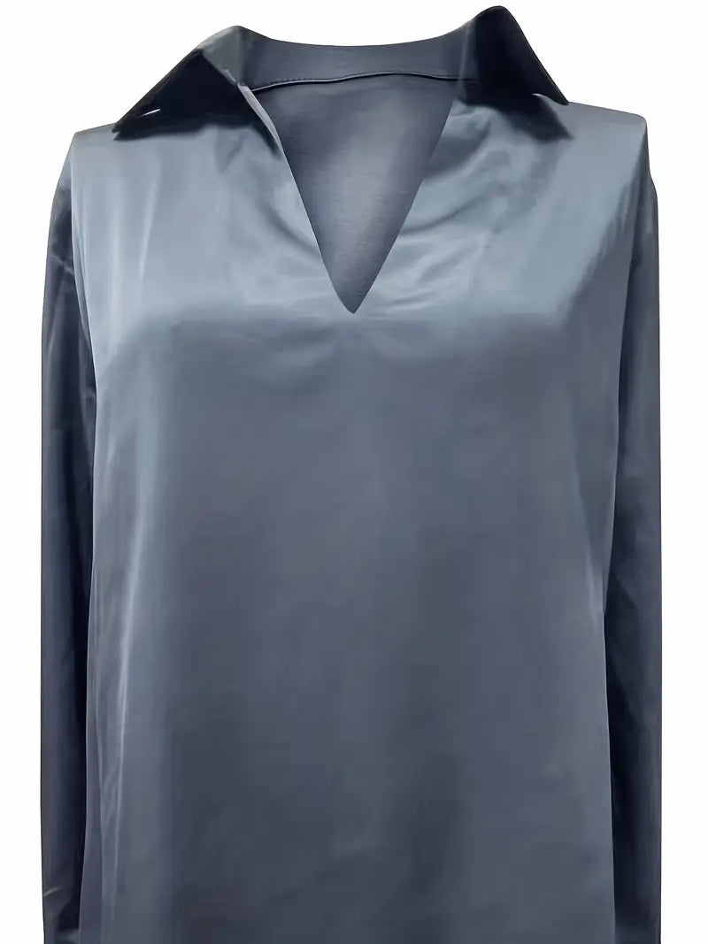 Flowy V-neck ladies' blouse, offering comfort & elegant fashion for any stylish look.