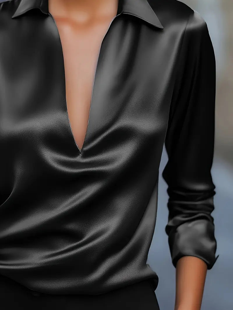 Elegant V-neck blouse for women, designed for effortless style and sophisticated versatility.