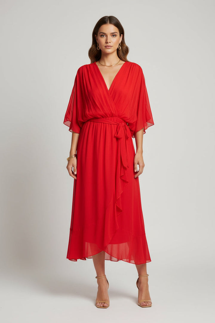 Women's elegant V-neck evening gown with short sleeves and flowing fit.
