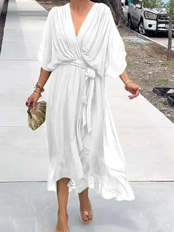 Beautiful women's V-neck gala dress, short sleeves, flowing design for celebrations.