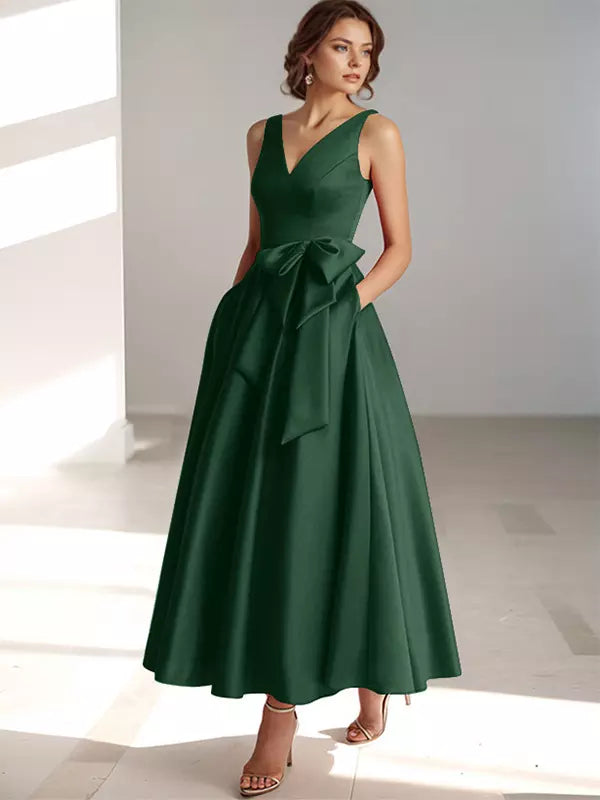 Elegant women's party dress with V-neck and adjustable bow waist for a perfect fit.