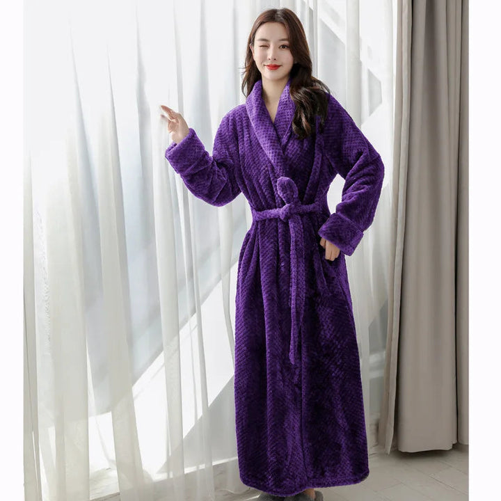 Model wearing a soft Evi plush bathrobe, showcasing its comfortable and stylish design.