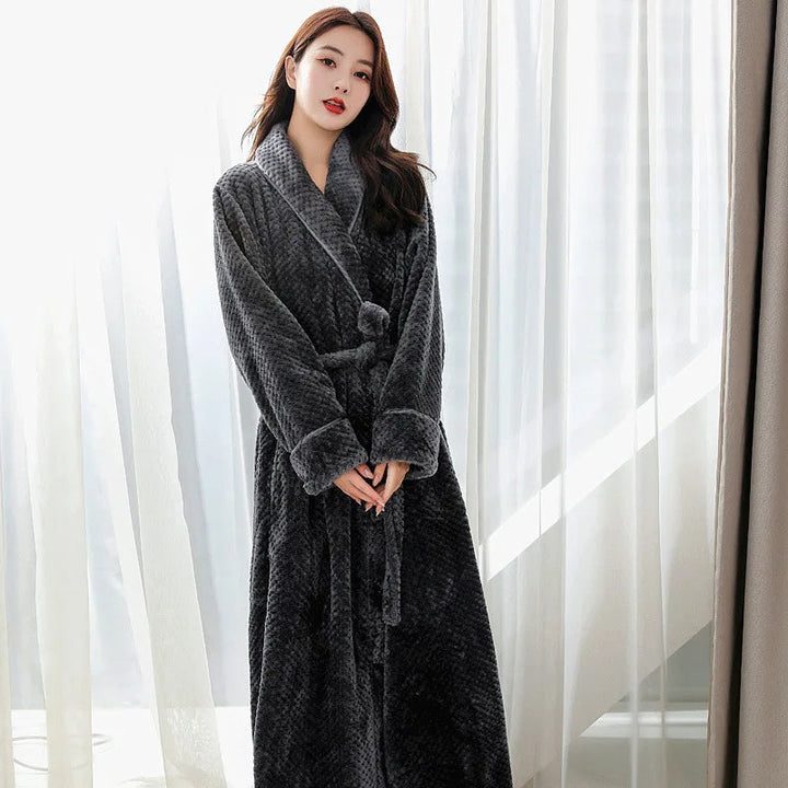 Close-up of the luxurious Evi plush fabric on a women's long bathrobe.