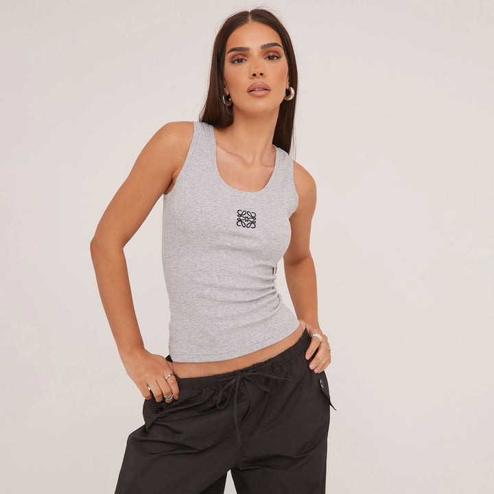Women's fitted racerback tank top in classic black, perfect for any occasion.