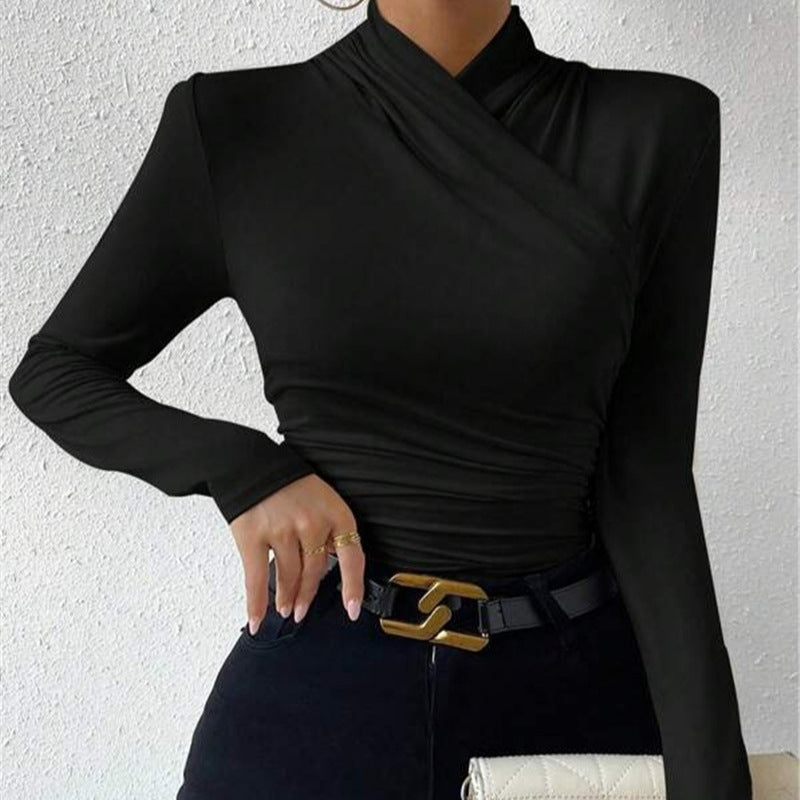 Fashionable women's fitted long sleeve top with a sophisticated wrap neck, offering a flattering silhouette.