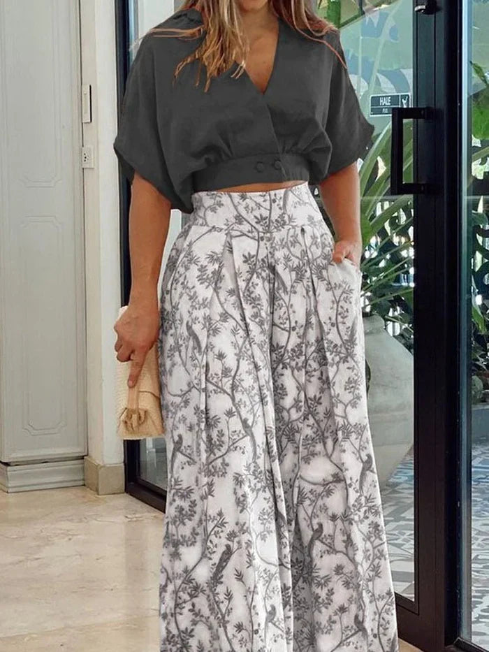 Plus size fashion: trendy floral print wide-leg pants set for women.