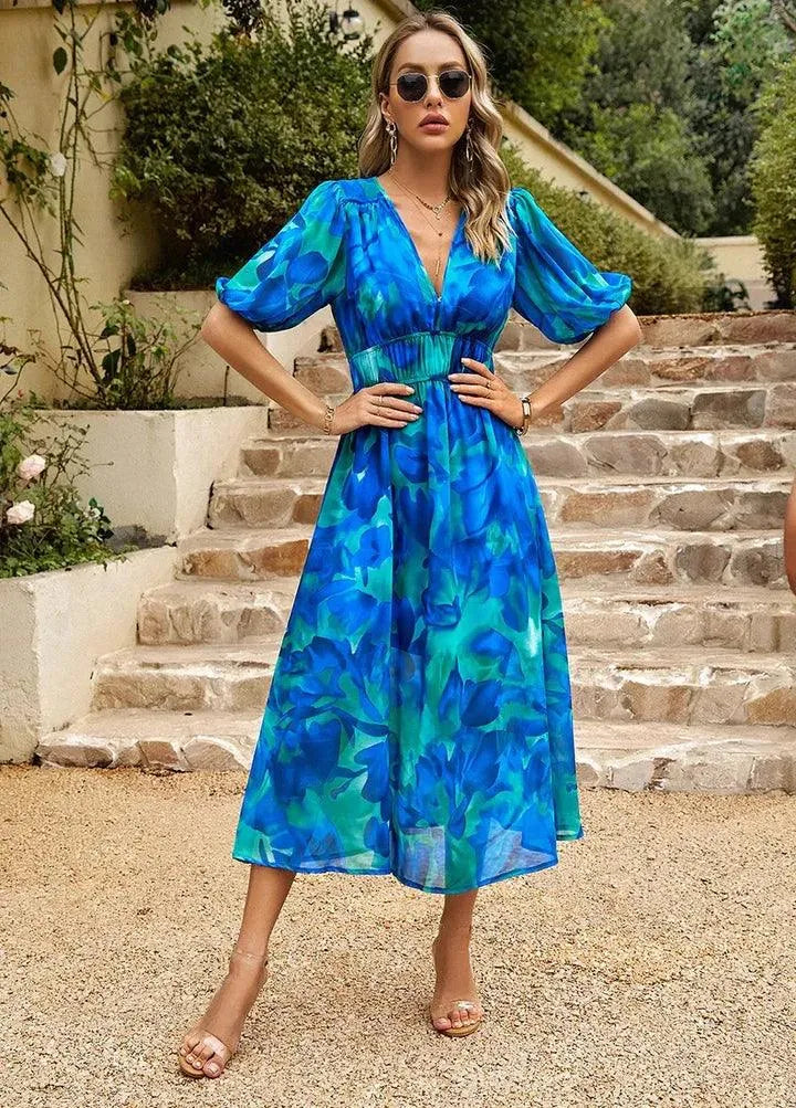 Women's floral v-neck midi races dress, perfect for summer parties.