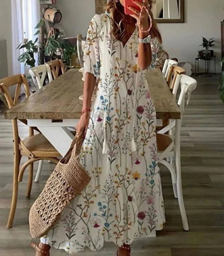 Women's A-line Boho Maxi Dress with stripe pattern. Effortlessly stylish and comfortable for summer vacations.