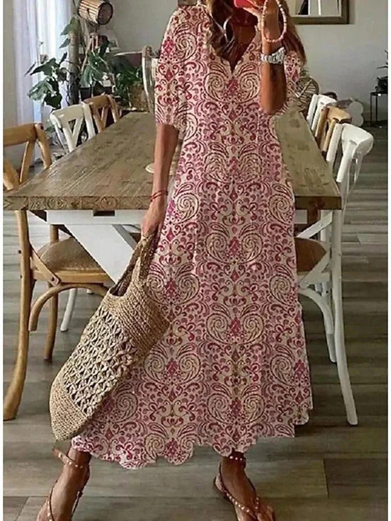 Chic Women's Luna Boho Maxi Dress, ideal for summer. Features a flowy A-line cut, V-neck, & half sleeves.