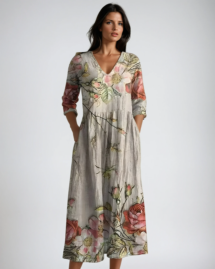 Women's flowy floral V-neck maxi dress, perfect for summer. Elegant & comfortable beach vacation wear.