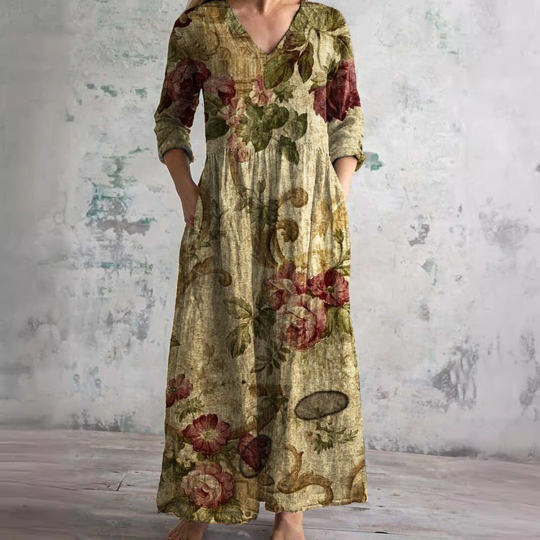 Comfortable women's floral summer maxi dress, featuring a flattering V-neck and a flowy design.