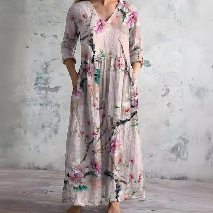 Casual women's summer floral V-neck maxi dress, light and airy. Great for vacations or beach outings.