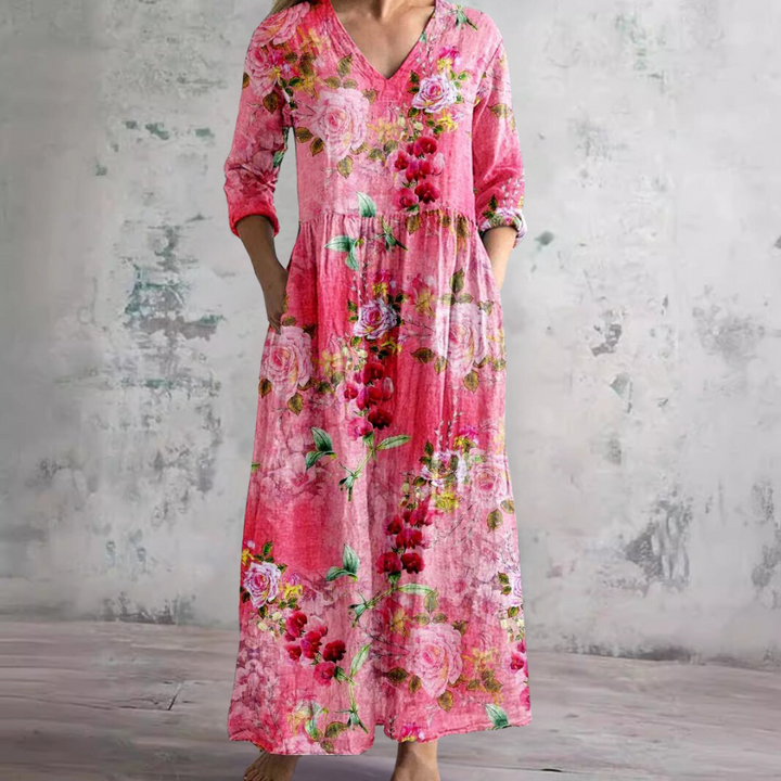 Vibrant floral print women's maxi dress, flowy and comfortable. A perfect V-neck summer beach dress.