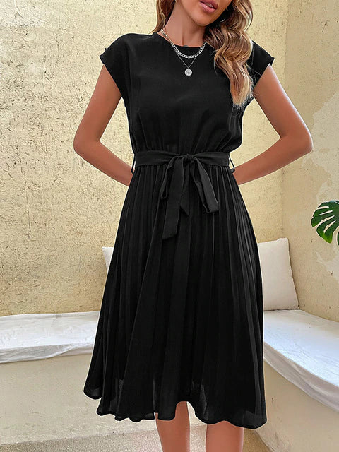 Women's flowy pleated midi summer dress with short sleeves and round neck