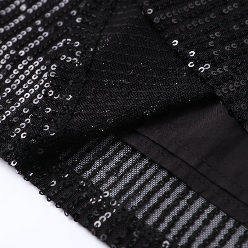 Get ready for any event in this stunning black sequin long sleeve mini dress.