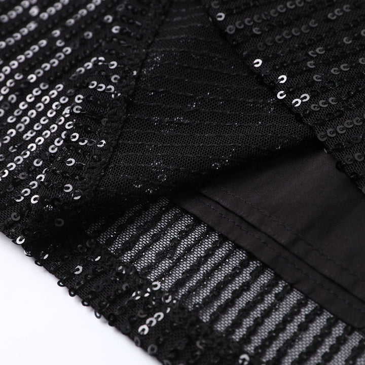 Get ready for any event in this stunning black sequin long sleeve mini dress.