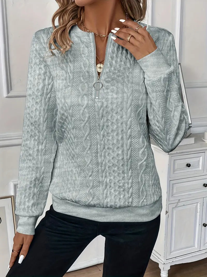 Ring pull half-zip women's jumper with ribbed hem; long-sleeve, casual-chic pullover sweater.