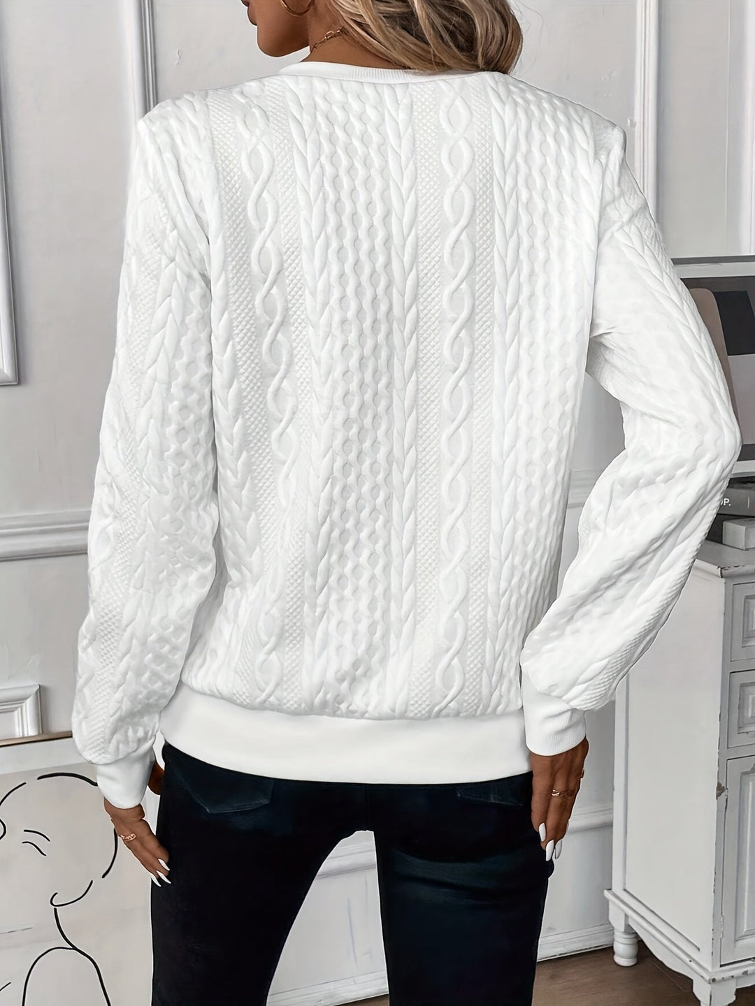 Textured women's half-zip pullover sweater with stylish ring pull & ribbed hem; casual-chic.