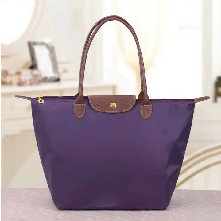Premium women's elegant handbag, a chic accessory for upscale occasions.