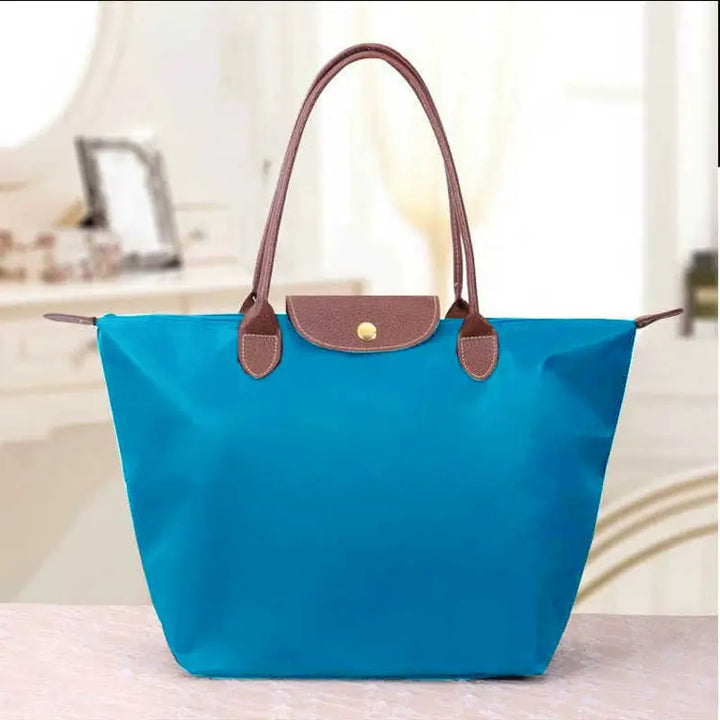 Women's smart tote handbag, spacious and elegant, perfect for a busy lifestyle.
