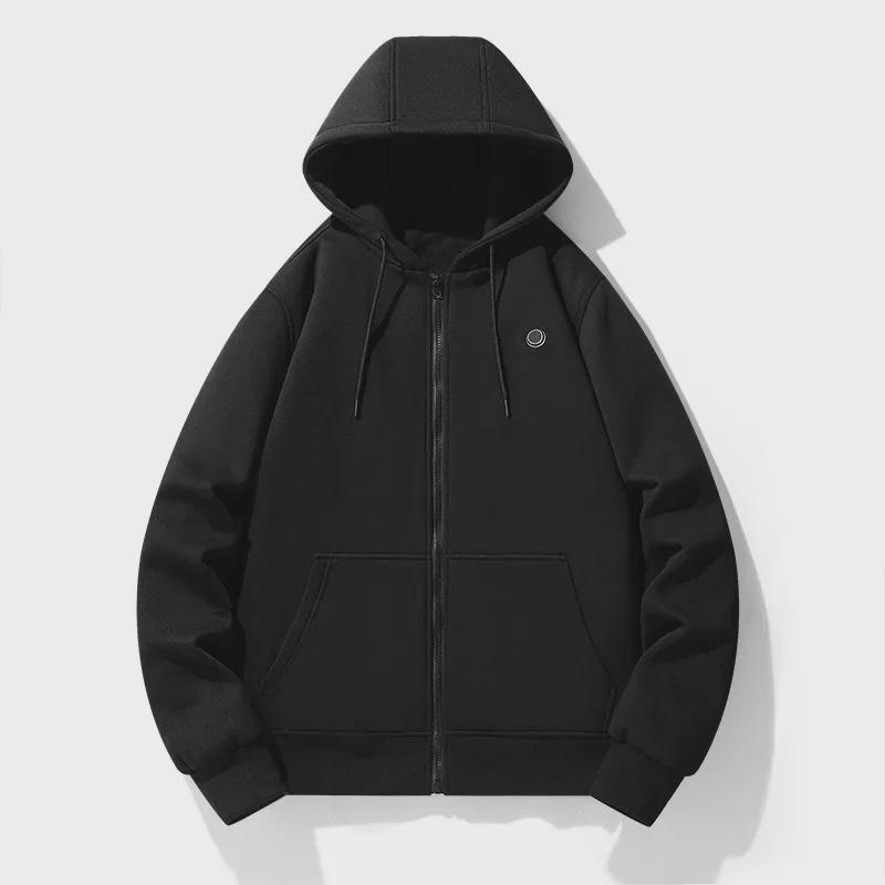 Model wearing a warm women's heated jacket hoodie, perfect for outdoor adventures.