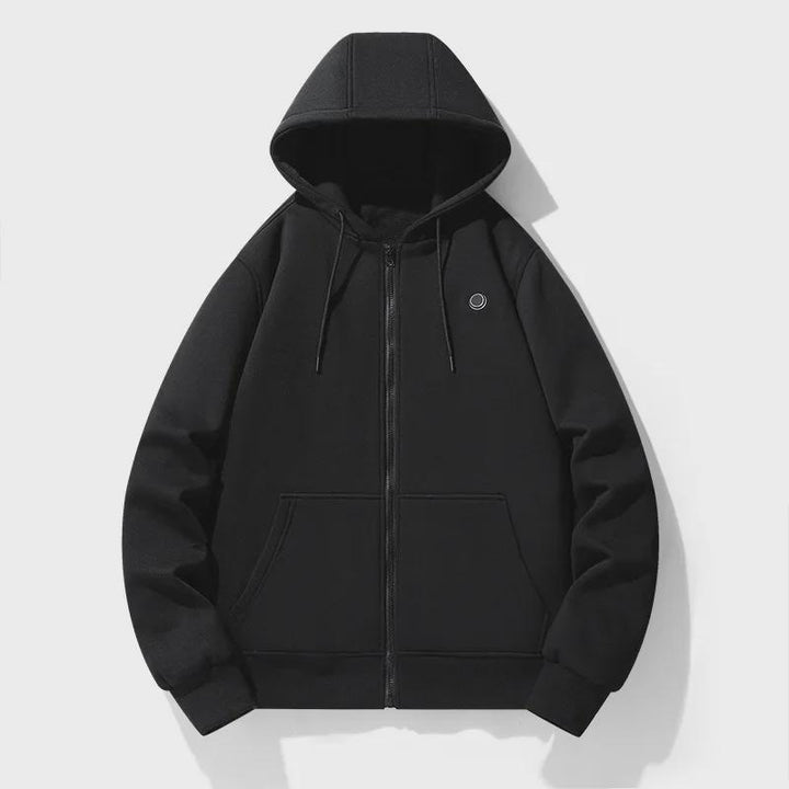 Model wearing a warm women's heated jacket hoodie, perfect for outdoor adventures.