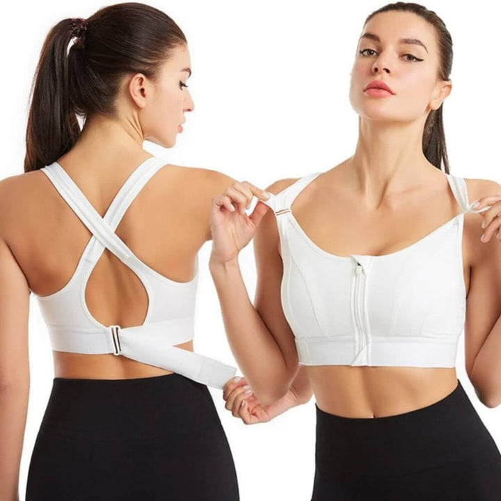 Pink women's sports bra offering maximum support and flexibility for fitness.