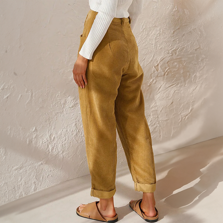 Vibrant yellow women's high waist tapered leg pants, offering comfortable and versatile style.