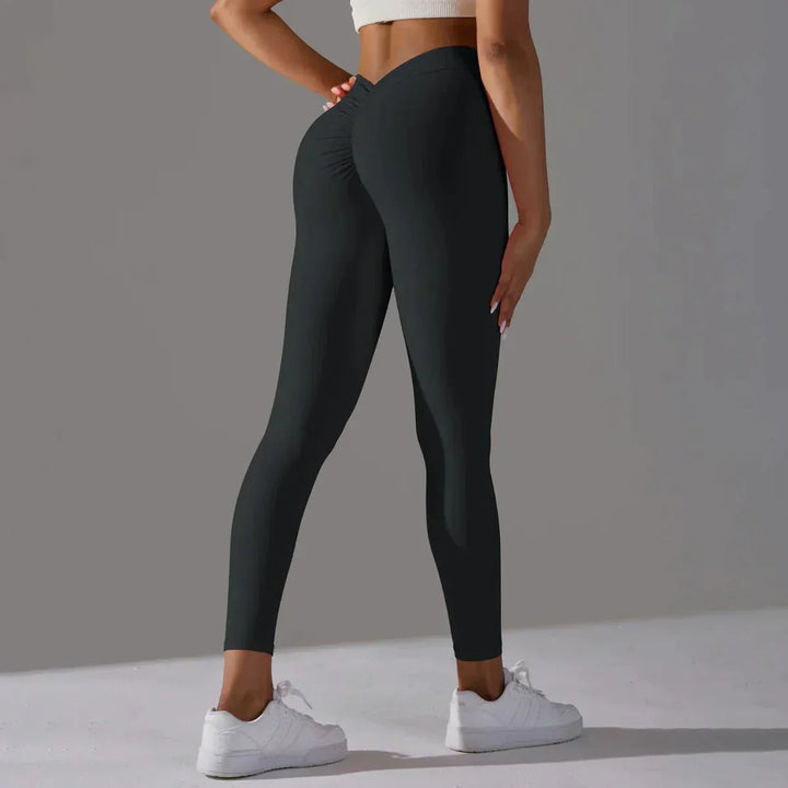 Close-up of the scrunch detail on women's compression yoga pants for a flattering fit