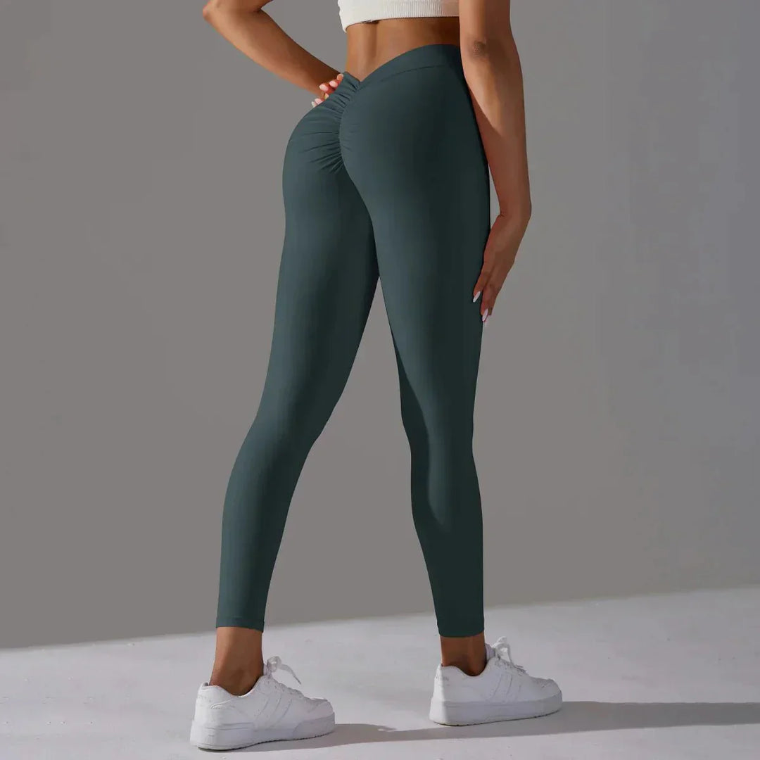 Full-body shot of women in seamless scrunch compression leggings, showcasing flexibility