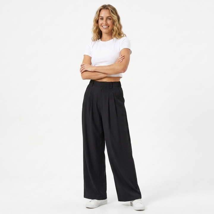 Stylish women's wide-leg trousers, high-waisted design for versatile fashion; great as work pants or casual chic.