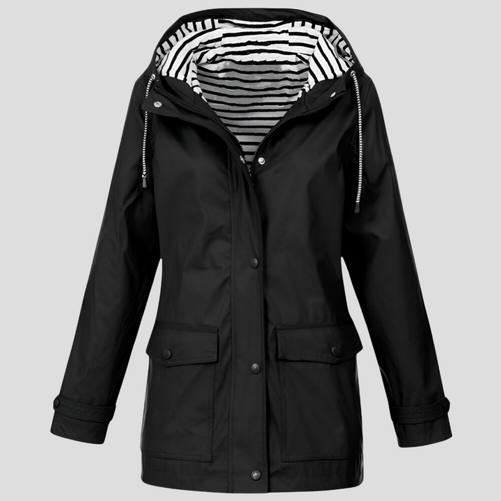 Lightweight women's rain jacket with hood, perfect for travel and active wear