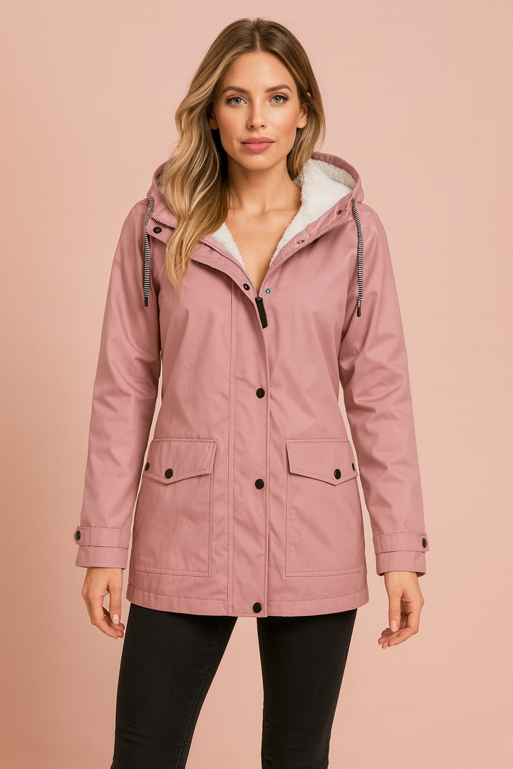 Close-up of the warm fabric on a women's hooded utility jacket for outdoor wear.