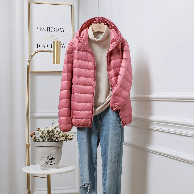Women's hooded zip-up puffer jacket for winter warmth and style