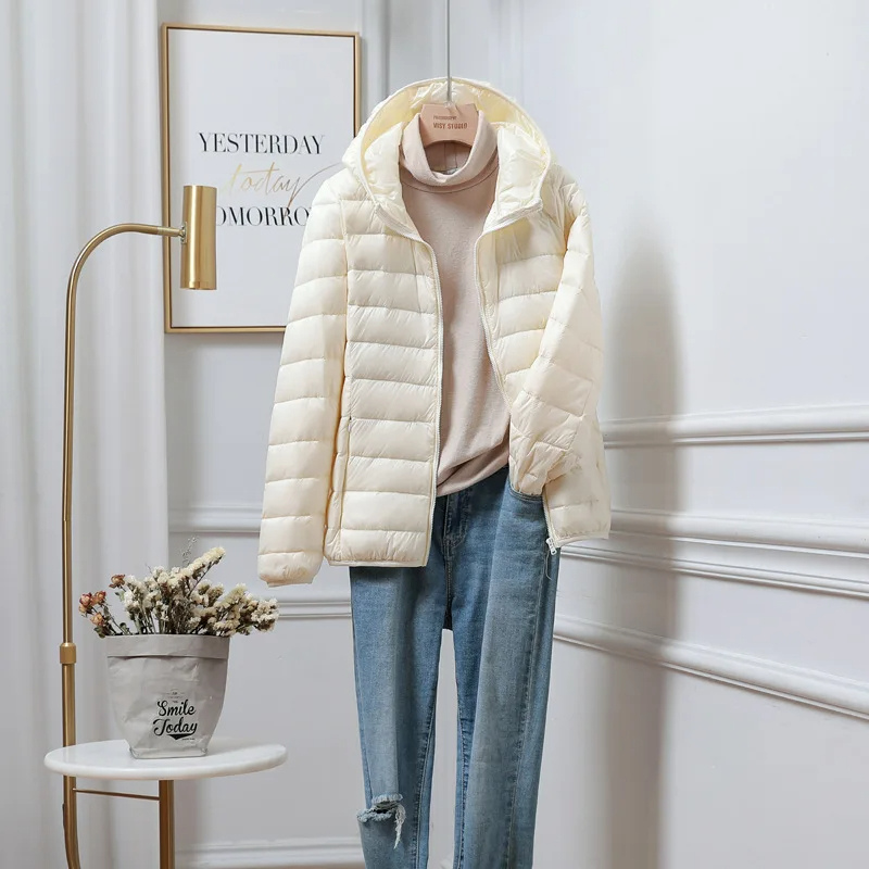Cozy quilted puffer jacket with a convenient zip-up front for women