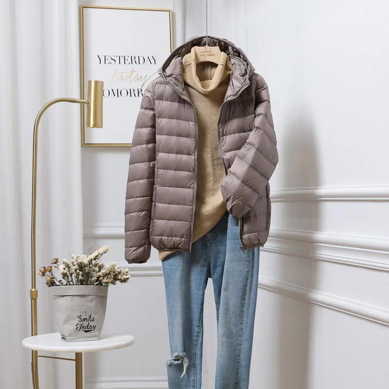 Stay warm this winter in a durable and stylish women's zip-up puffer
