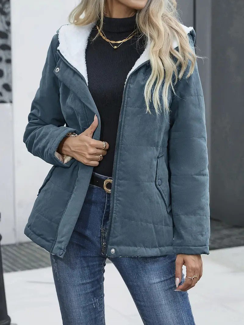 Women's hooded zip-up winter jacket in navy blue, fully lined for warmth.