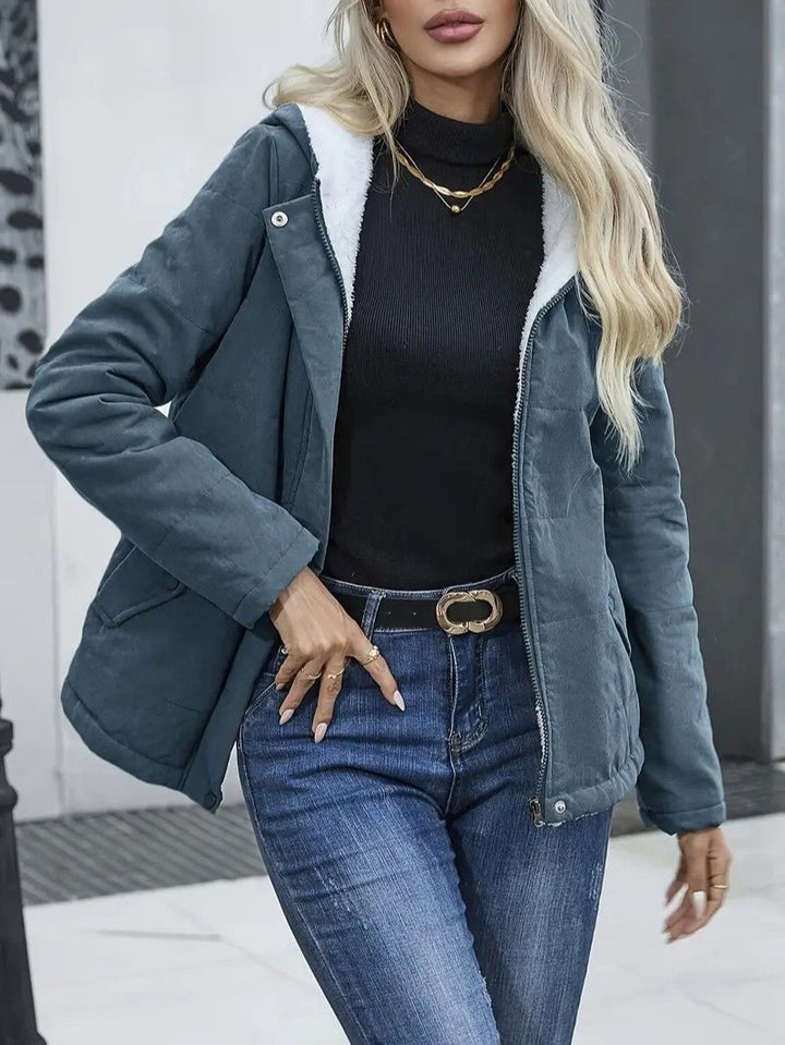 Cozy women's lined winter jacket with a convenient zip-up front and hood.