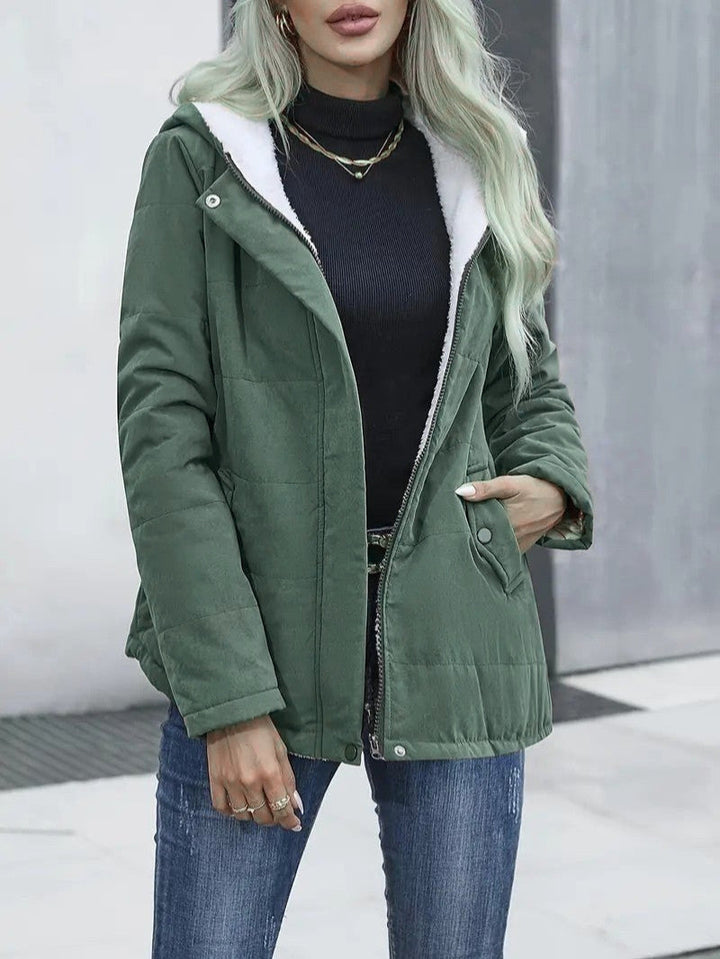 Detail of the hood adjustment on a women's lined casual jacket.