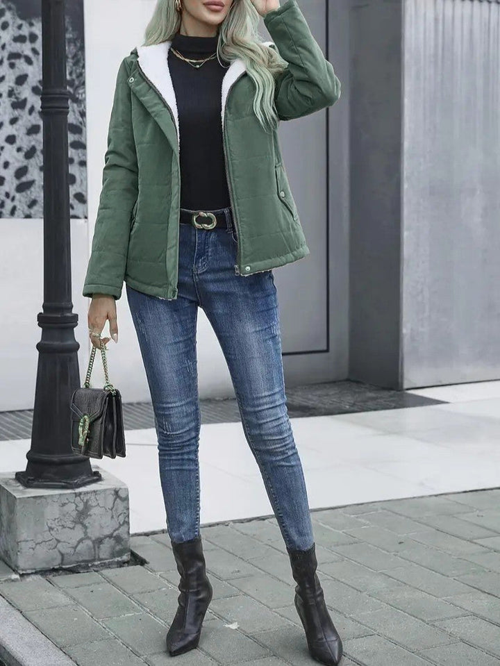 Comfortable and warm women's zip-up jacket, designed for winter adventures.