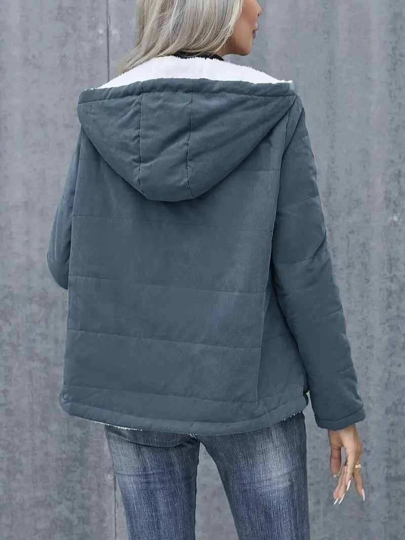 Stylish women's casual outerwear: a warm, hooded zip-up jacket for fall.