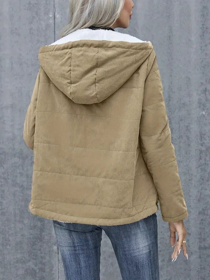 Casual women's fall fashion: a comfortable hooded zip-up lined jacket.