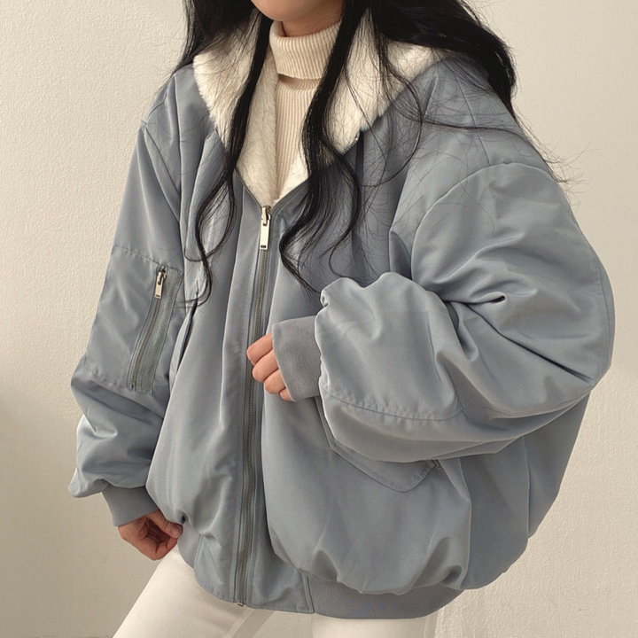 Stylish women's hooded jacket, Isla reversible design for versatile fall and winter fashion.
