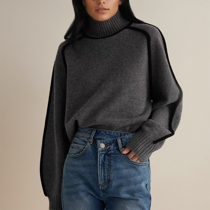 Cozy women's relaxed fit turtleneck jumper with contrast trim. Ideal layering piece for everyday elegance.