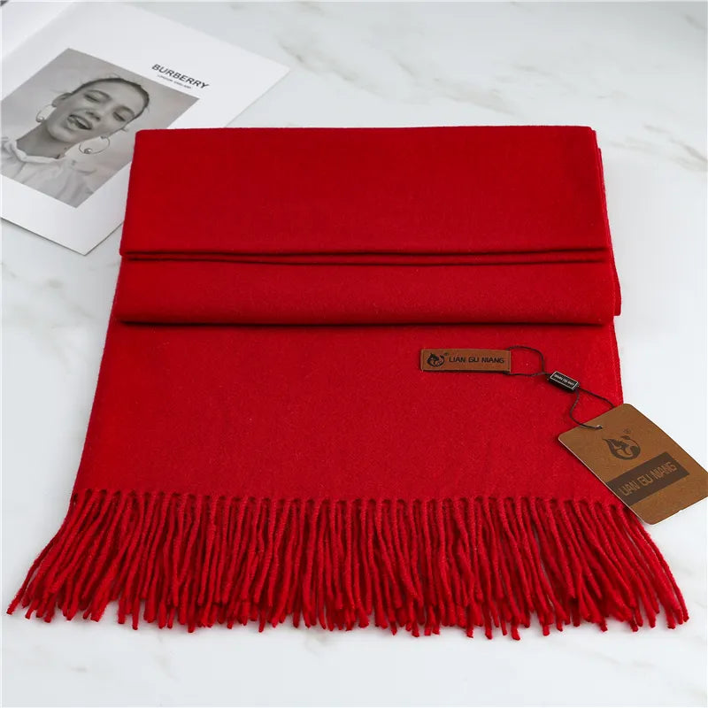 Close-up of soft Krystal cashmere scarf with delicate tassel details