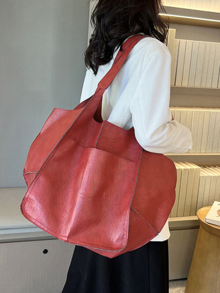 Fashionable women's shoulder bag. Large tote for everyday use, stylish carryall handbag.