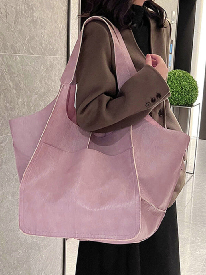 Versatile women's large tote bag. A chic shoulder handbag, great for travel, work, or everyday fashion.