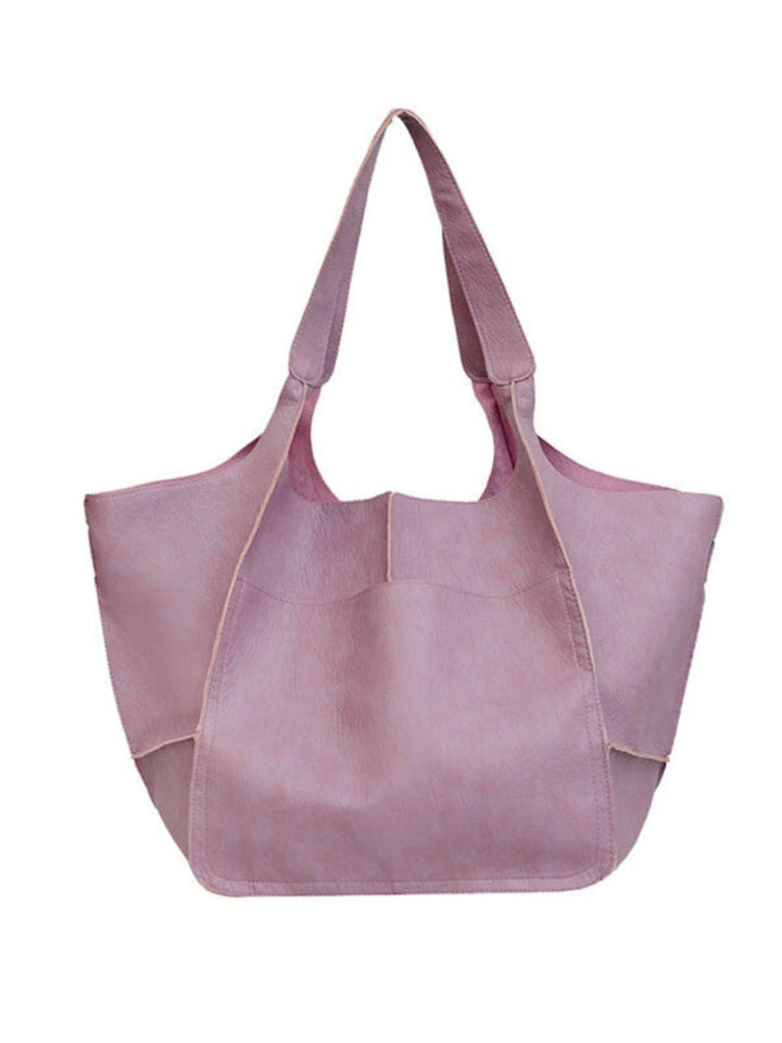 Women's fashion large tote bag. Stylish shoulder carryall designed for travel, daily errands & convenience.