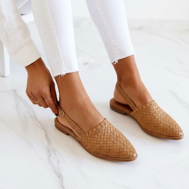 Comfortable navy woven women's flats with a soft cushioned insole for daily use.