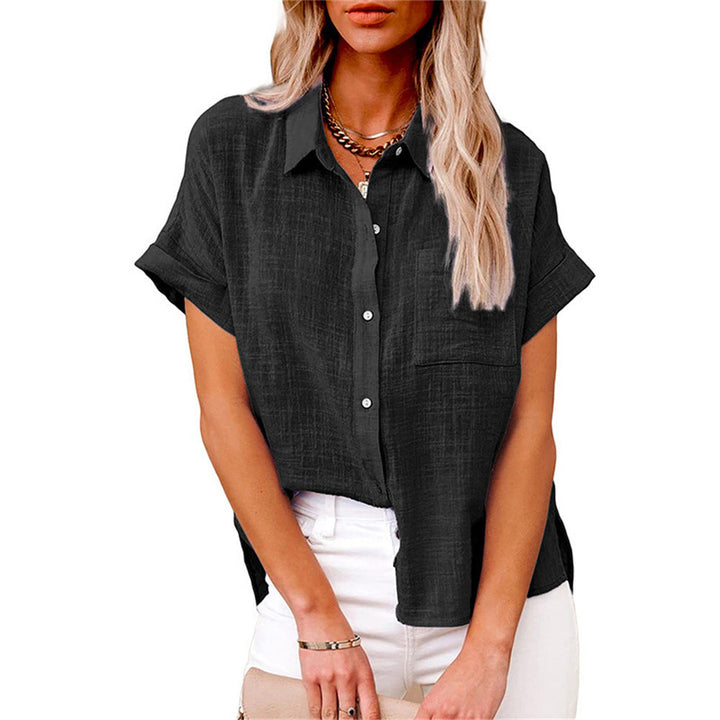 Women's lightweight button-up shirt with a single front pocket. Versatile long sleeve top.